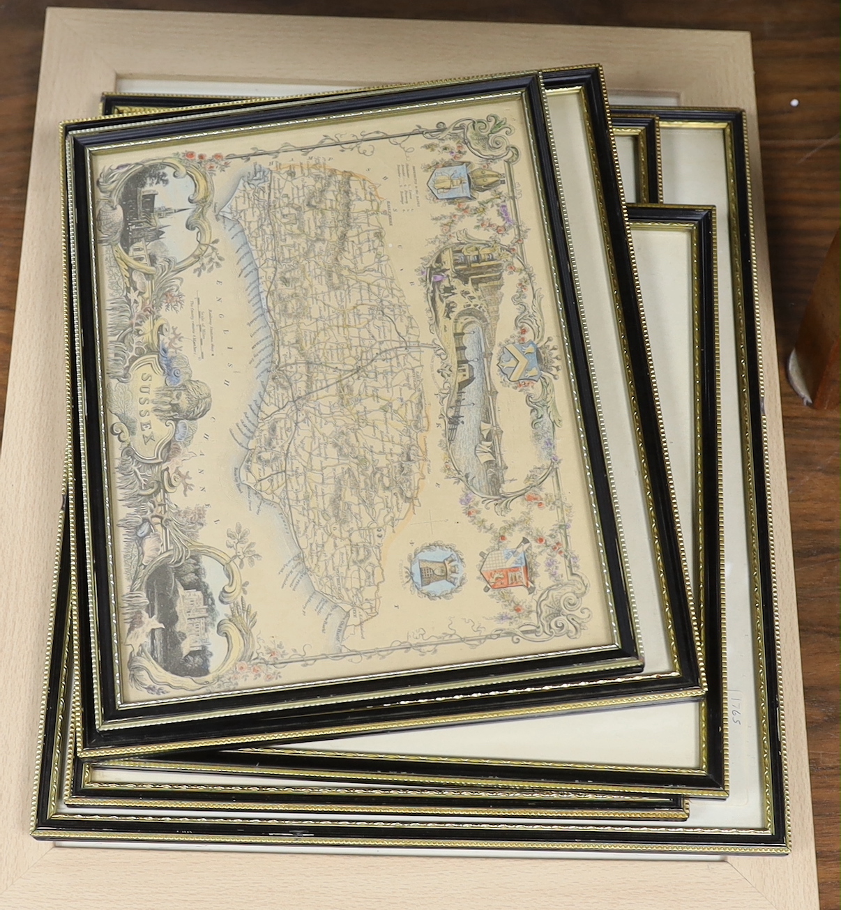 Seven framed Sussex related 18th and 19th century maps, including examples by T. Moule, T. Kitchin, J. Ellis, etc. largest 32 x 22cm